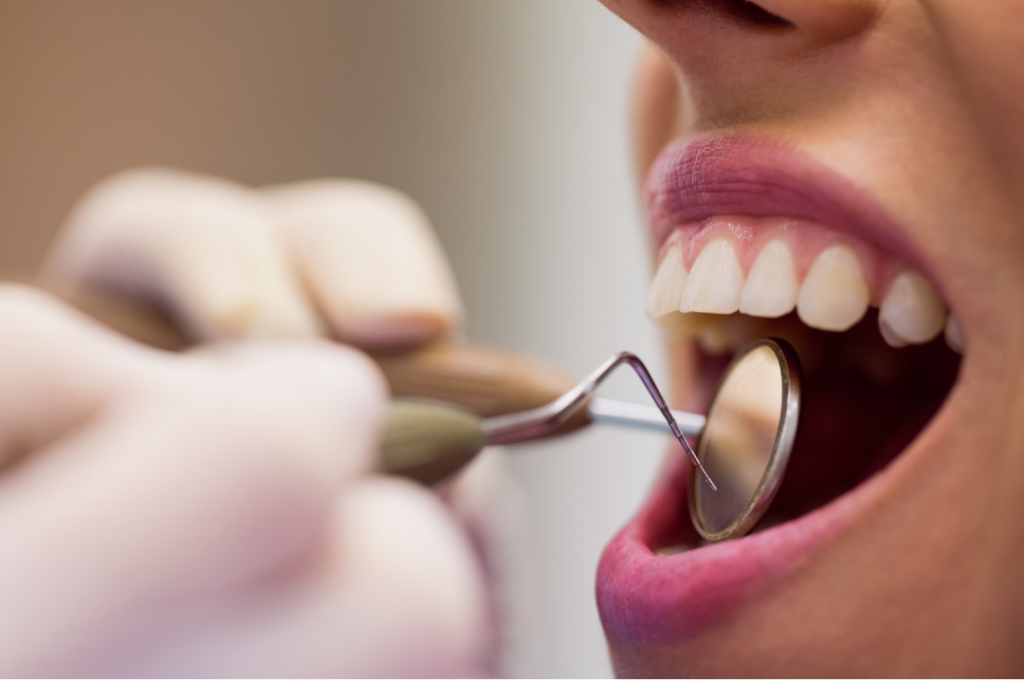 Mouth Cancer 2 Dentist instrumentation used to examine open mouth